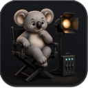 Koala in a director's chair beside a stage light